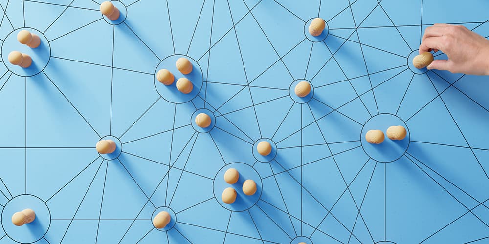 Image of a data mesh on a blue background depicting the potential connections in data by leveraging AI.