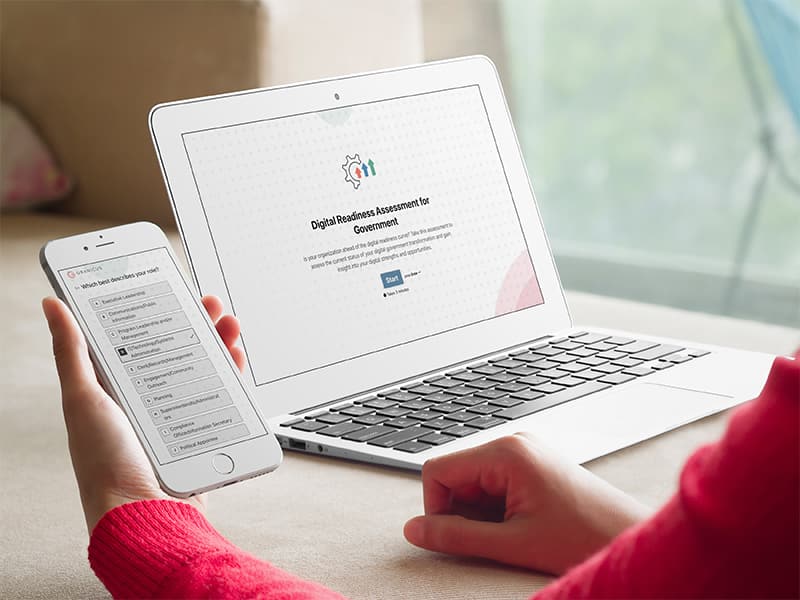 Government IT professional filling out the Granicus Digital Government Readiness survey on her mobile phone.