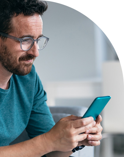 Man completing service requests at home on phone