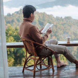 Man relaxing at short term rental