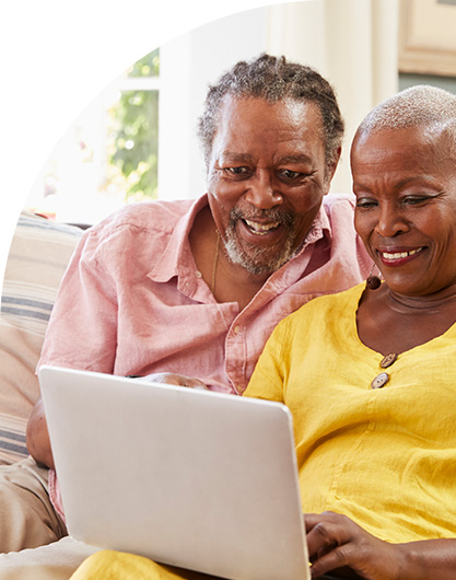 Couple using laptop to engage with local government services