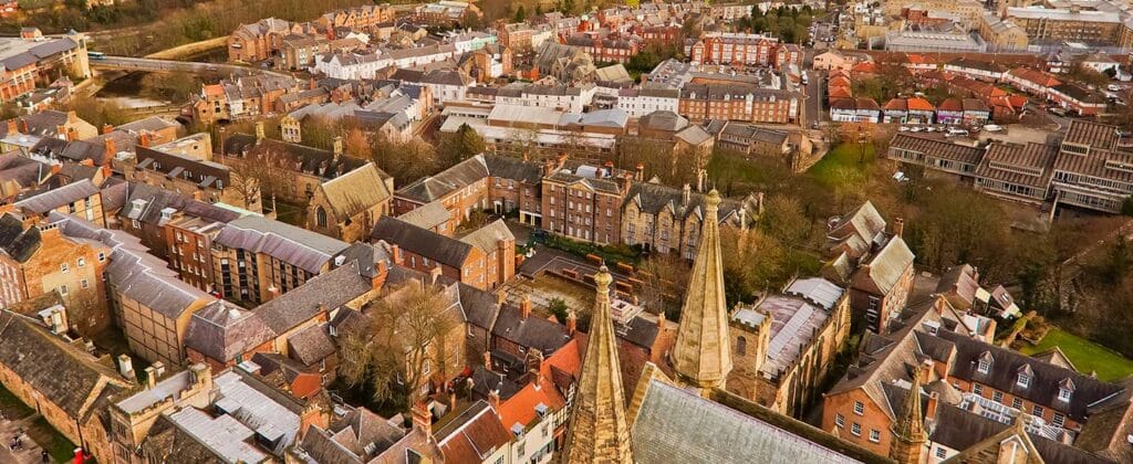 Durham County aerial view church steeples and housing